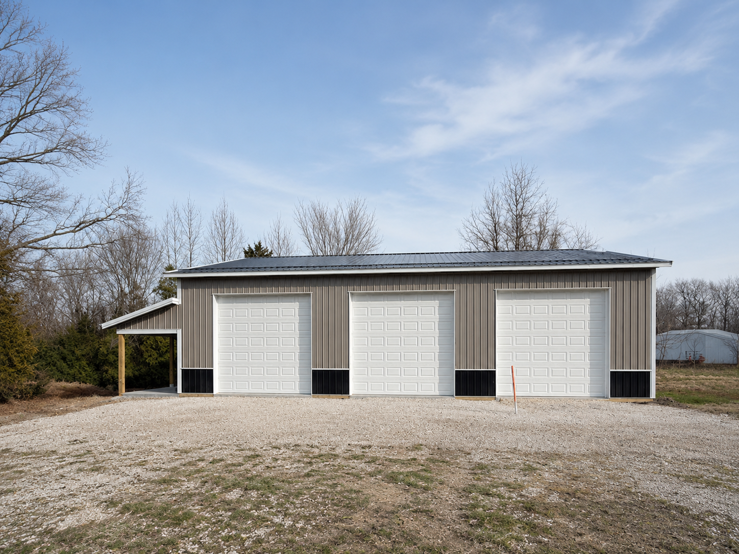 Completed 40' x 54' pole barn with lean-to porch, front view